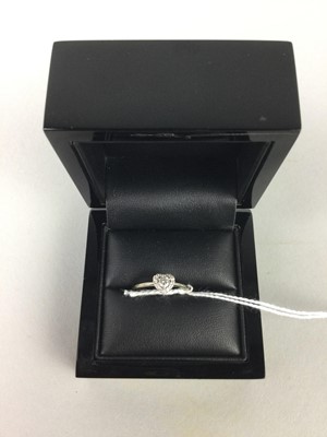 Lot 611 - A DIAMOND HEART SHAPED CLUSTER RING