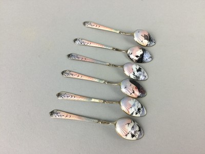 Lot 643 - A SET OF SIX SILVER-GILT AND ENAMEL COFFEE SPOONS