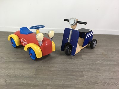 Lot 525A - A CHILD'S TOY CAR AND A POLICE BIKE