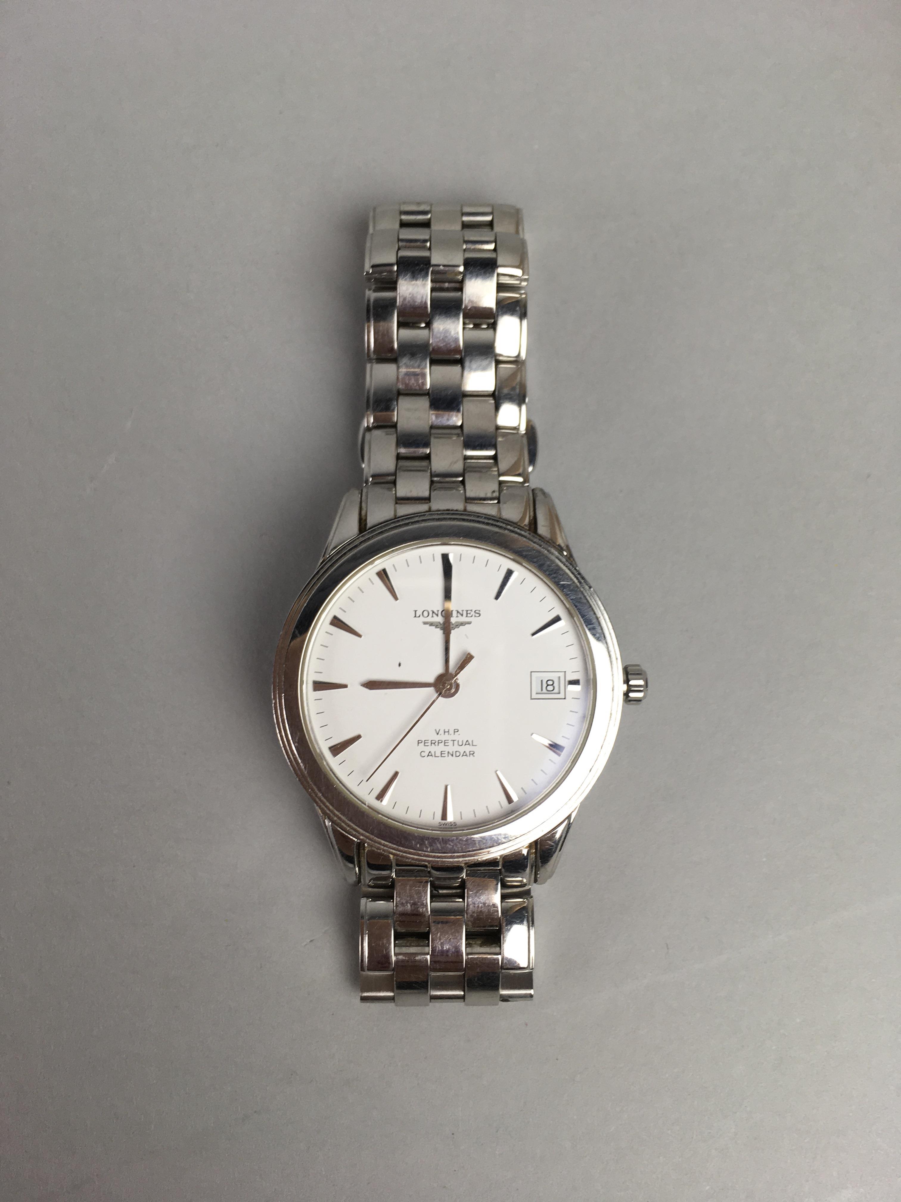 Lot 40 A GENT S LONGINES STAINLESS STEEL WRIST WATCH