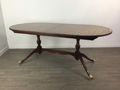 Lot 676 - A MAHOGANY DINING SUITE