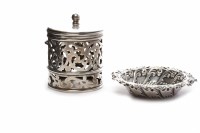 Lot 548 - LATE VICTORIAN PIERCED SILVER JAR AND COVER...