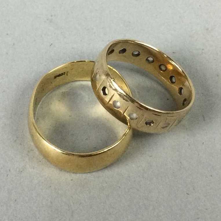 Lot 4 - A NINE CARAT GOLD RING AND ANOTHER