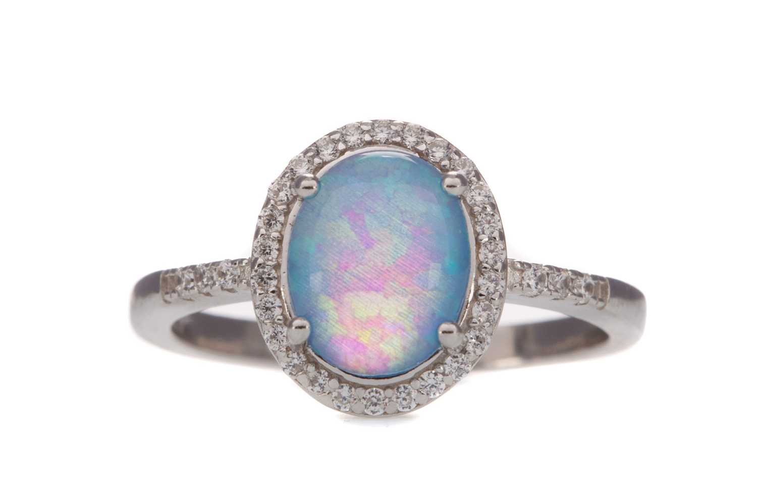 Lot 477 - AN OPALITE AND CUBIC ZIRCONIA RING