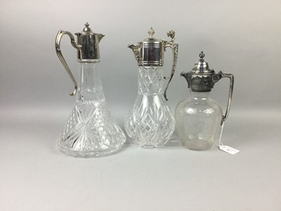 Lot 66 - A VICTORIAN SILVER PLATED AND GLASS CLARET JUG