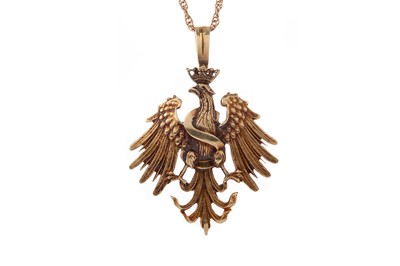 Lot 515 - A RUSSIAN FOURTEEN CARAT GOLD EAGLE PENDANT ON CHAIN