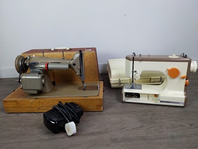 Lot 145 - A PFAFF SEWING MACHINE ALONG WITH ANOTHER