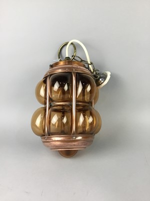 Lot 150 - A COPPER AND AMBER GLASS HALL PENDANT