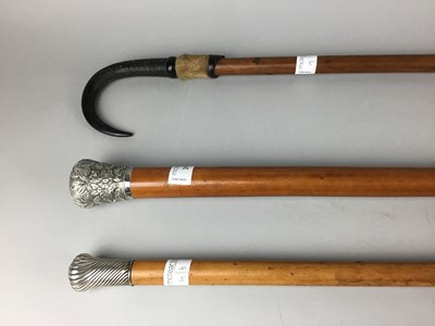 Lot 29 - A VICTORIAN MALACCA WALKING CANE AND OTHERS