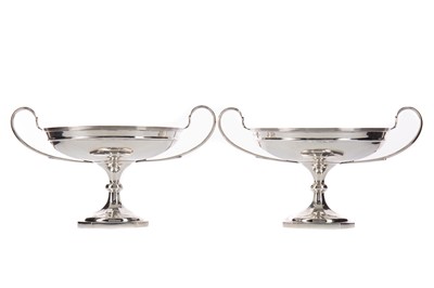 Lot 28 - A PAIR OF GEORGE V SILVER PEDESTAL BOWLS