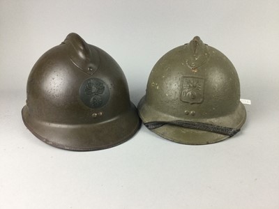 Lot 327 - TWO FRENCH 'ADRIAN' STEEL HELMETS