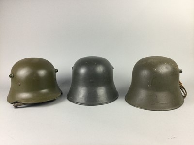 Lot 337 - THREE WWI GERMAN STYLE STEEL HELMETS