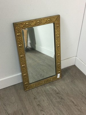 Lot 207 - A WALL MIRROR IN A BRASS FRAME AND TWO FURTHER MIRRORS