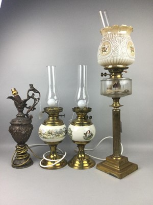 Lot 224 - AN OIL LAMP ALONG WITH TWO PAIRS OF LAMPS