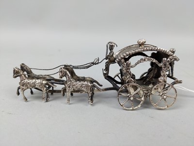 Lot 237 - A SILVER PLATED MINIATURE MODEL CARRIAGE