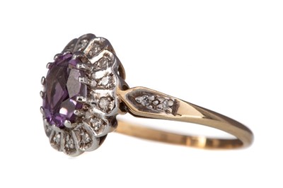 Lot 1156 - AN AMETHYST AND DIAMOND CLUSTER RING