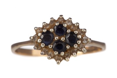 Lot 1130 - A GOLD SAPPHIRE AND DIAMOND RING