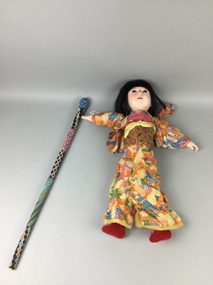 Lot 423 - AN EARLY 20TH CENTURY JAPANESE GOFUN ICHIMATSU DOLL ALONG WITH A WITCH DOCTOR'S STICK