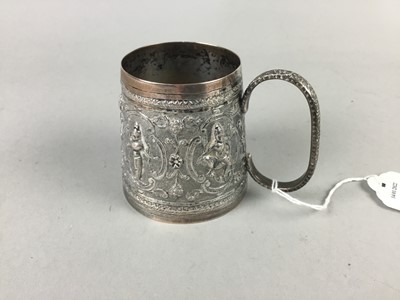 Lot 435 - AN INDO-BURMESE SILVER PLATED CHRISTENING MUG