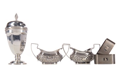 Lot 53 - A GEORGE V SILVER SUGAR CASTER, ALONG WITH A PAIR OF OPEN SALTS AND NAPKIN RINGS