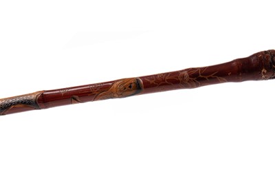 Lot 1095 - A JAPANESE LACQUERED WALKING STICK
