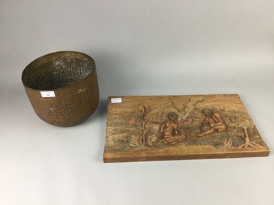 Lot 482 - A PERSIAN BRASS PLANTER AND A CARVED PANEL