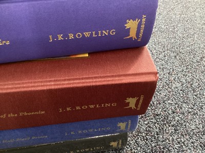 Lot 973 - A FULL SET OF HARRY POTTER FIRST DELUXE EDITIONS