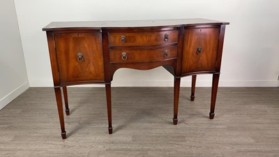 Lot 598 - A MAHOGANY DINING SUITE