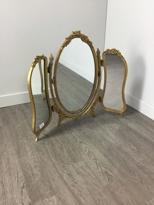 Lot 600 - A CAST GILT METAL TRIPTYCH DRESSING MIRROR