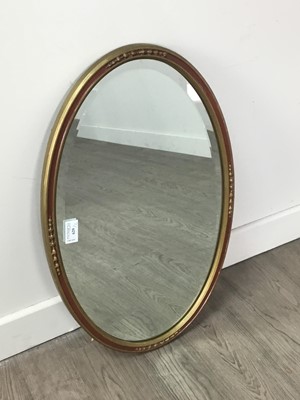 Lot 286 - AN OVAL BEVELLED WALL MIRROR AND ANOTHER WALL MIRROR