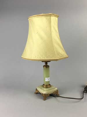 Lot 618 - A REPRODUCTION PASTILLE BURNER AND AN ONYX TABLE LAMP