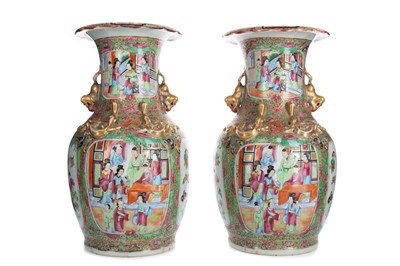 Lot 1062 - A PAIR OF CANTONESE BALUSTER TWIN HANDLED VASES