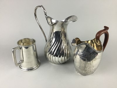 Lot 557 - A SILVER PLATED WATER JUG AND OTHER PLATE