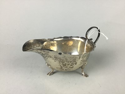 Lot 579 - A MAPPIN & WEBB SILVER SAUCE BOAT