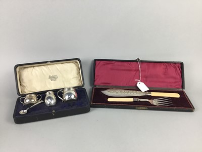 Lot 581 - A CASED THREE PIECE SILVER CONDIMENT SET ALONG WITH PLATED FISH SERVERS