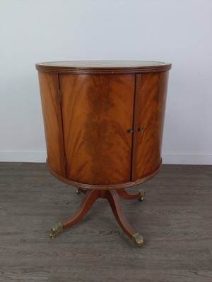 Lot 647 - A REVOLVING DRUM LIBRARY TABLE