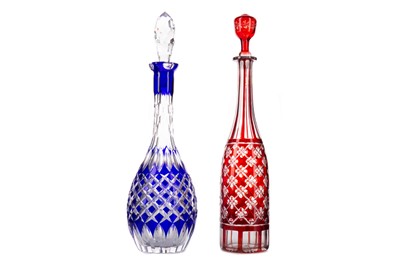Lot 845 - A RUBY AND CLEAR GLASS DECANTER AND A BLUE AND CLEAR GLASS DECANTER