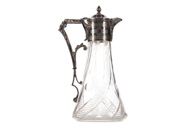 Lot 69 - A LATE VICTORIAN CUT GLASS AND SILVER PLATED CLARET JUG