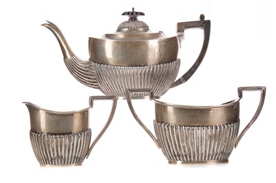 Lot 66 - AN EARLY 20TH CENTURY SILVER THREE-PIECE TEA SERVICE