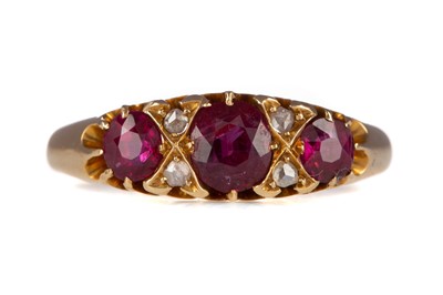 Lot 1206 - A SYNTHETIC RUBY AND DIAMOND RING