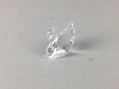 Lot 250 - A SET OF SIX SOUTH AFRICAN GLASS NOVELTY NAPKIN RINGS AND A SWAROVSKI SWAN