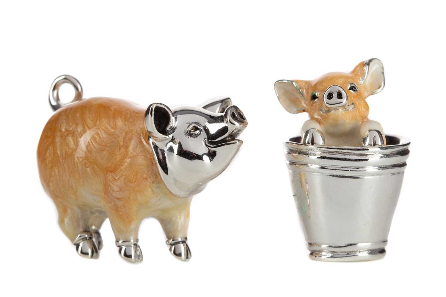 Lot 82 - TWO SILVER AND ENAMELLED NOVELTY MODEL PIGS