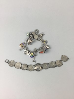 Lot 19 - A SILVER CHARM BRACELET AND ANOTHER