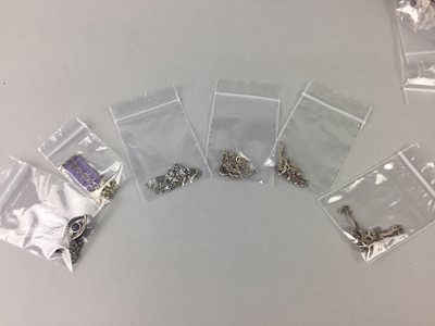 Lot 26 - A LOT OF TEN VARIOUS SILVER PENDANTS WITH CHAINS