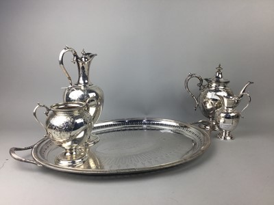 Lot 130 - A VICTORIAN PLATED FOUR PIECE TEA AND COFFEE SERVICE AND TRAY