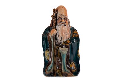 Lot 1078 - A 20TH CENTURY CHINESE EARTHENWARE FIGURE OF SHOU LAO