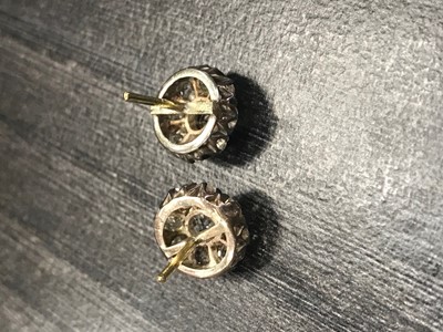 Lot 1228 - A PAIR OF DIAMOND CLUSTER EARRINGS