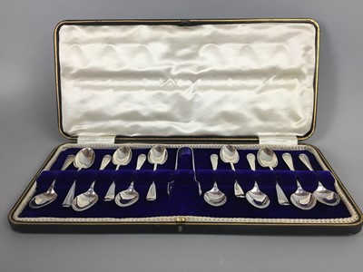 Lot 56 - A SET OF TWELVE SILVER RAT TAIL PATTERN COFFEE SPOONS AND TONGS
