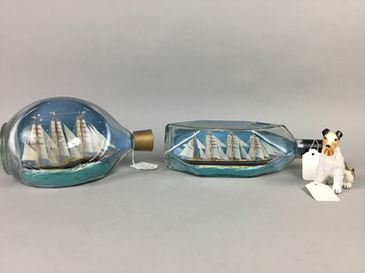 Lot 248 - A BORDER FINE ART 'TUG O' WAR' FIGURE GROUP, A CERAMIC DOG AND TWO SHIPS IN BOTTLES