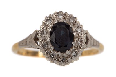 Lot 1212 - A SAPPHIRE AND DIAMOND CLUSTER RING